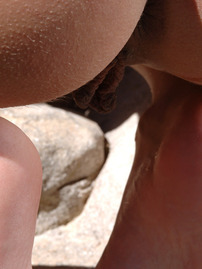 Andie Posing Naked On The Rocks