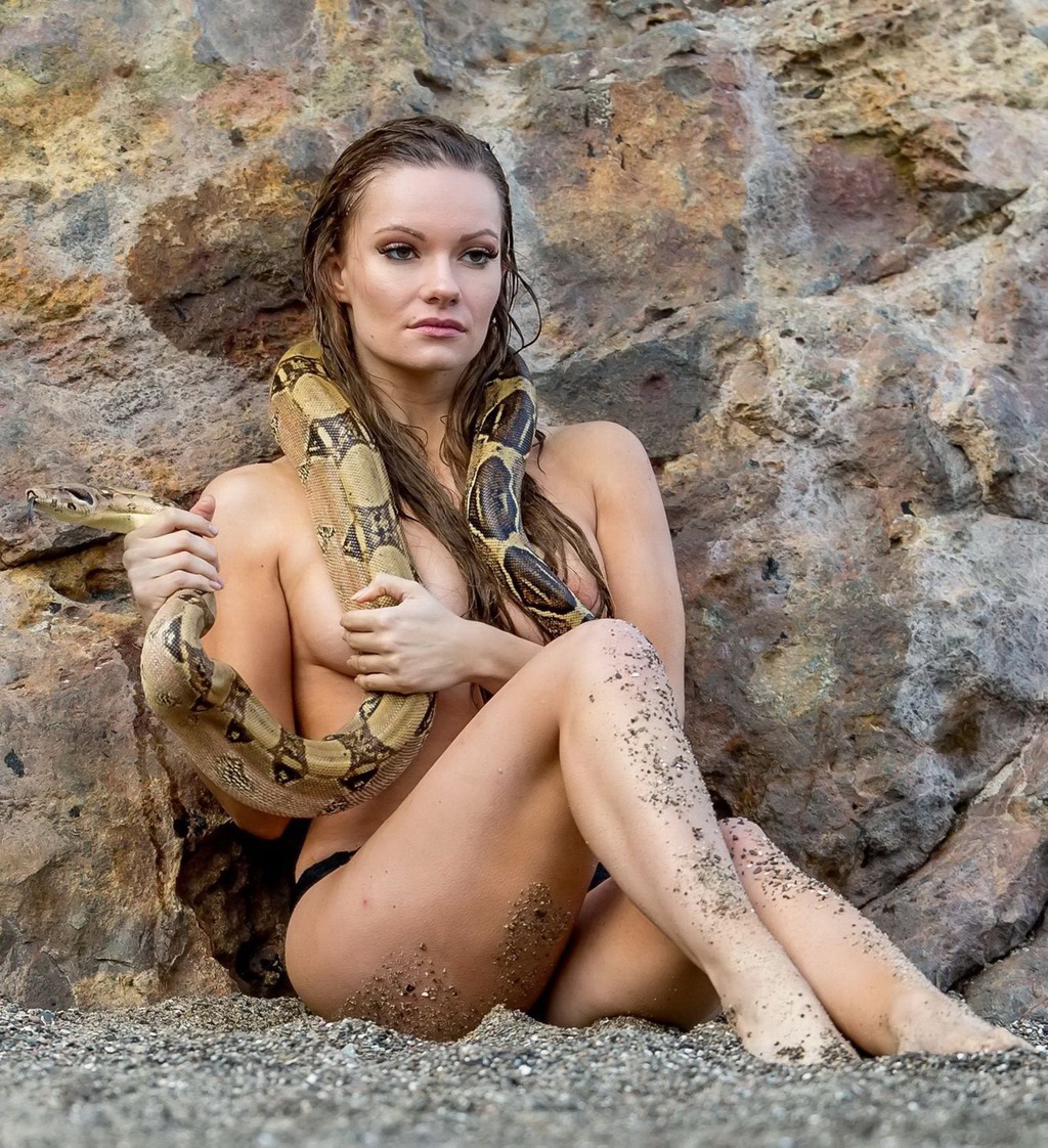 Topless Caitlin O'Connor Holding A Giant Snake 10