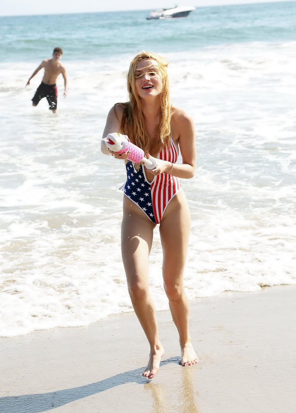 Bella Thorne In Low Cut National Colored Swimsuit 10