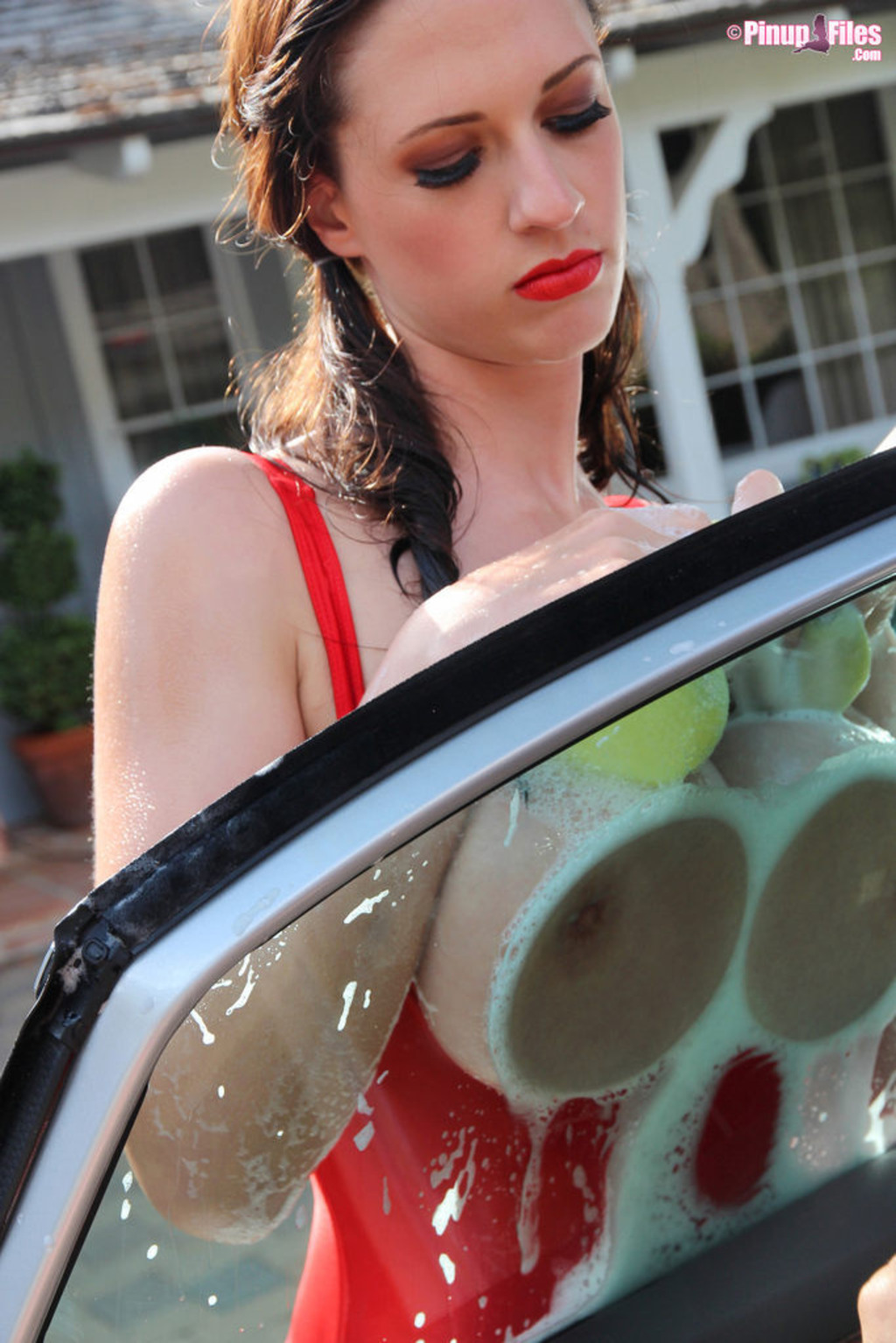 Busty Lana Kendrick Washing Her Car In A Swimsuit 10