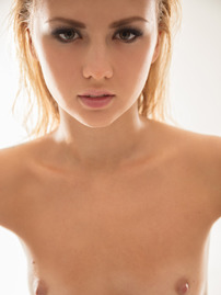 Beautiful Slim Blonde Jati Flaunting Her Flawless Oiled-up Naked Body